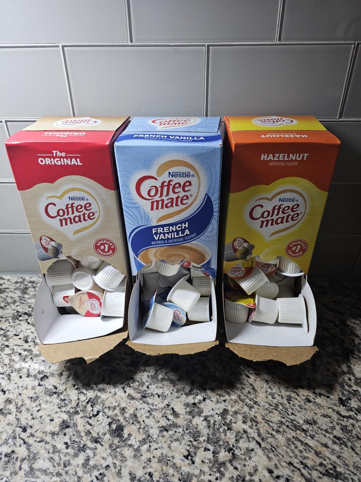 Nestle Coffee mate Creamer Singles Variety Pack, Original, French Vanilla, Hazelnut, Non Dairy, No Refrigeration, 0.375 fl oz Tubs, 150 Count (Pack of 50 Per Flavor) - Customer Photo 1