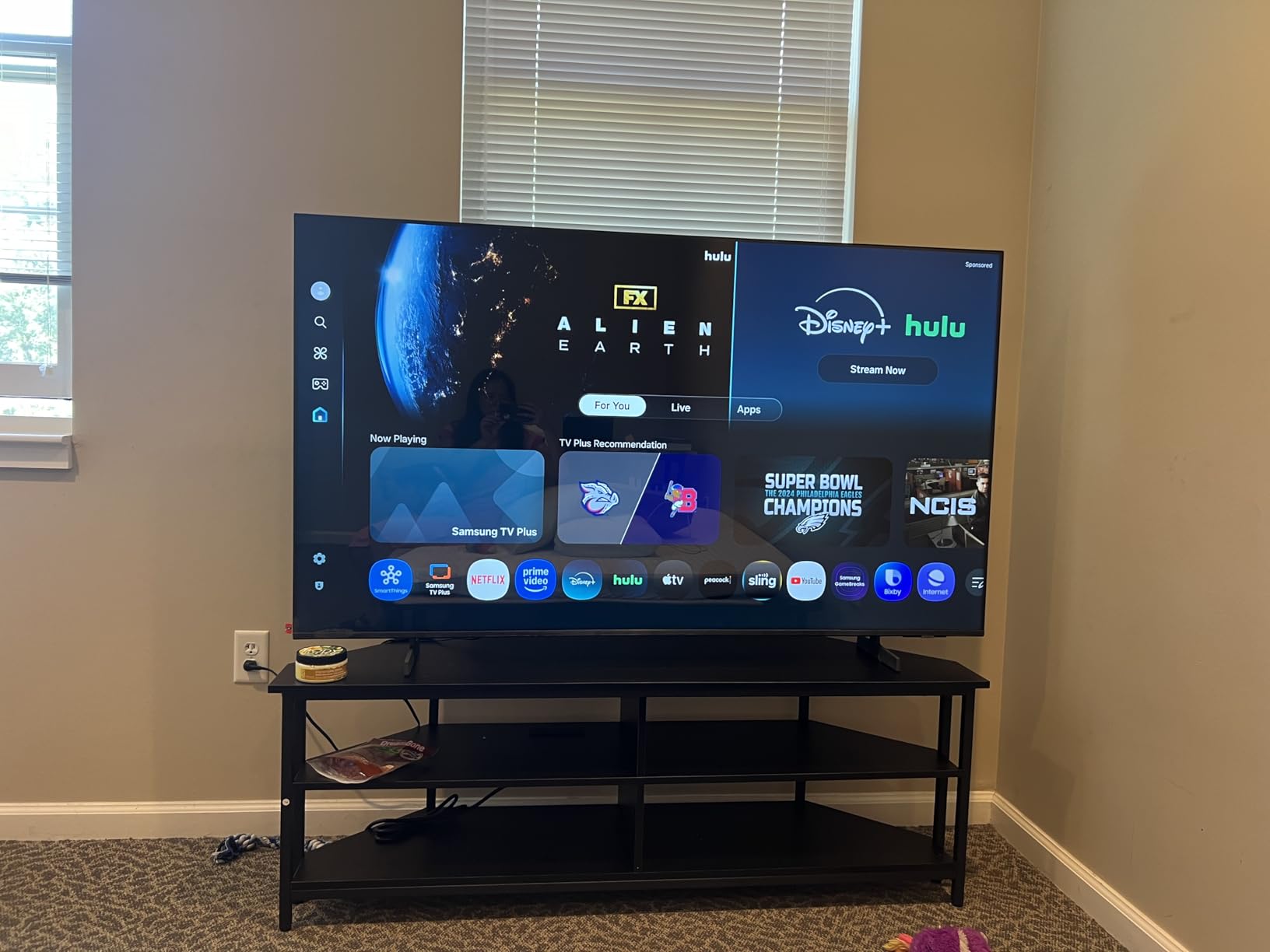 Giantex Corner TV Stand for 65 Inch TV, Modern Entertainment Center w/Power Outlet, Storage Shelves&Metal Frame, Media TV Console Table for Living Room, Bedroom, Small Spaces, Black Customer Review Giantex Corner TV Stand for 65 Inch TV, Modern Entertainment Center w/Power Outlet, Storage Shelves&Metal Frame, Media TV Console Table for Living Room, Bedroom, Small Spaces, Black - Customer Photo 1