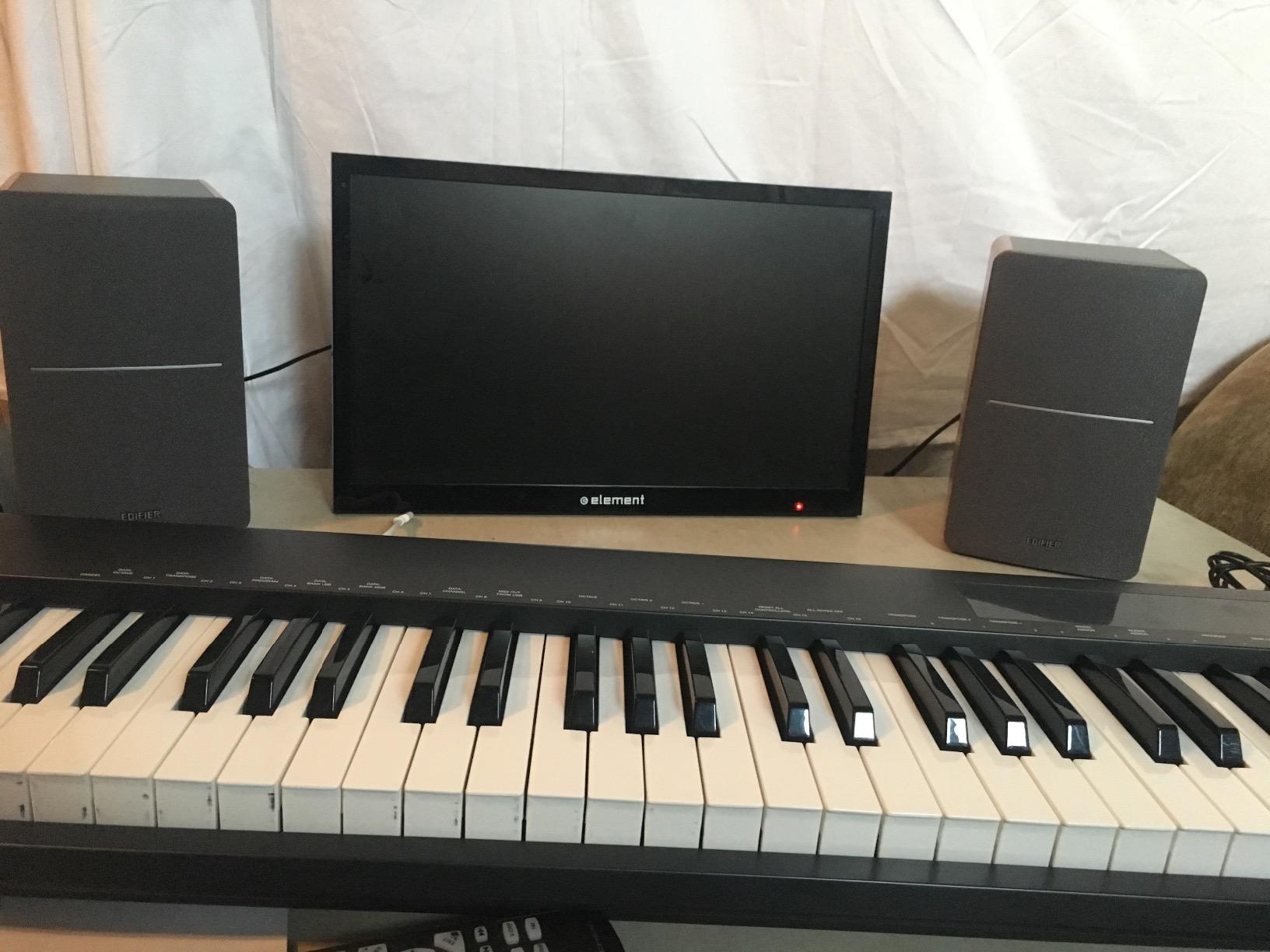 Edifier R1280T Powered Bookshelf Speakers - 2.0 Active Near Field Studio Monitor Speaker - Wooden Enclosure - 42 Watts RMS Power Customer Review Edifier R1280T Powered Bookshelf Speakers - 2.0 Active Near Field Studio Monitor Speaker - Wooden Enclosure - 42 Watts RMS Power - Customer Photo 1