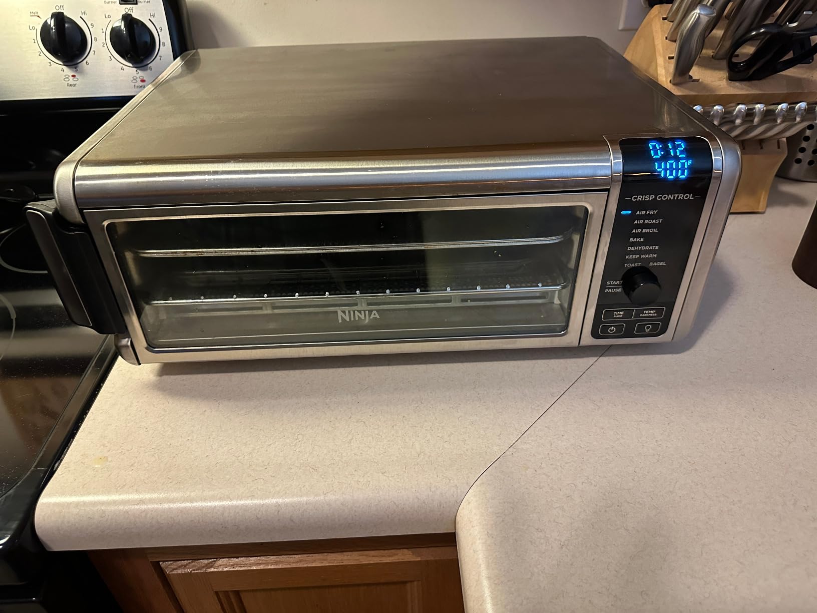 Ninja Digital Air Fry Countertop Oven, 8-in-1 Functionality, 1800W, Flip-Up Design, XL Capacity, Air Fry Basket, Wire Rack & Crumb Tray, Silver, SP101 - Customer Photo 5